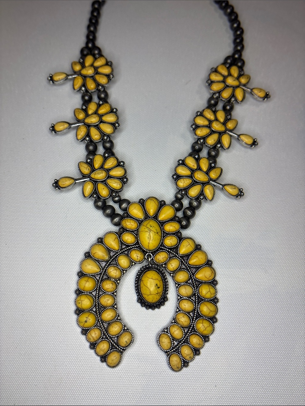 Yellow dyed Howlite Squash Blossom necklace